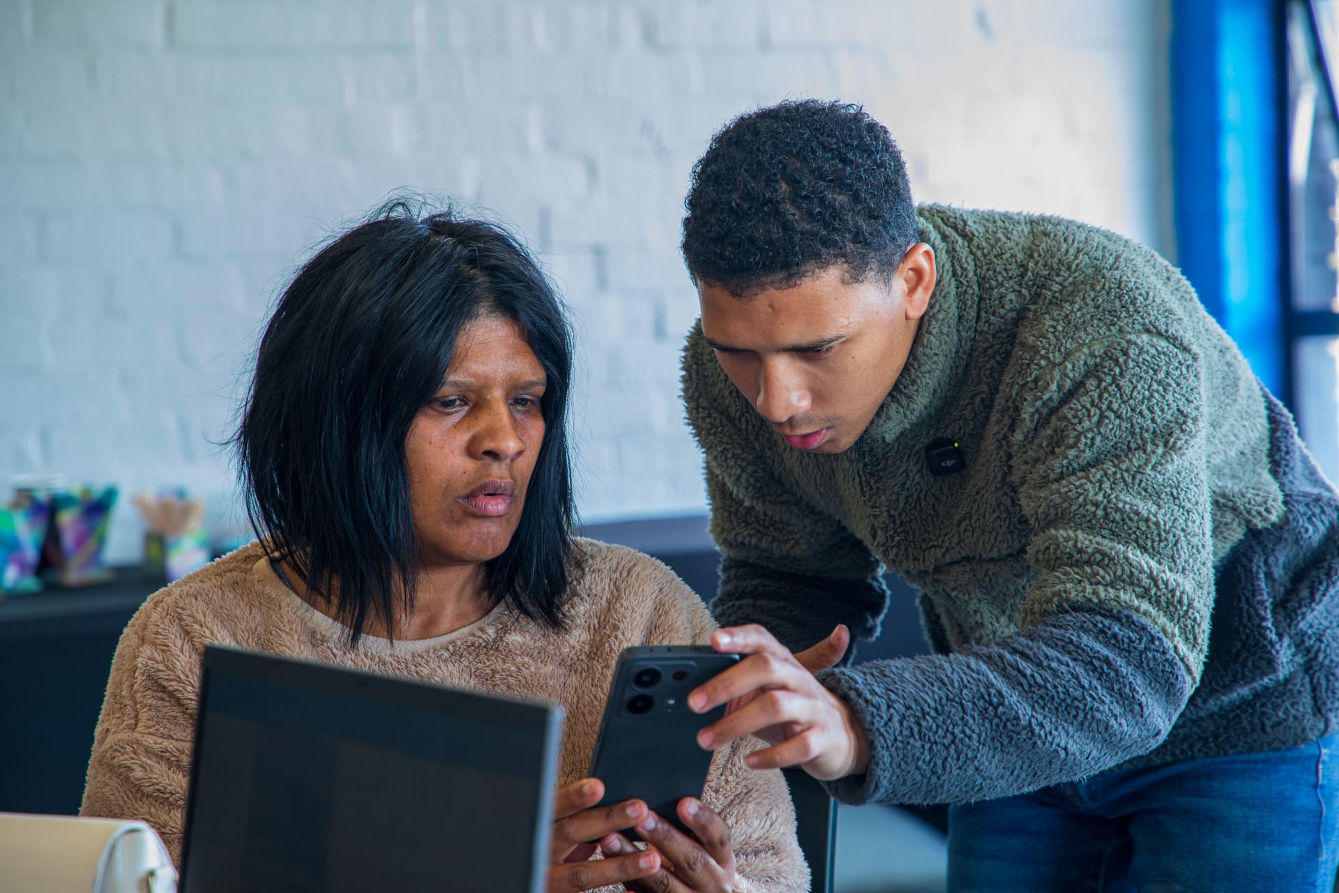 A FRED coach working with a learner